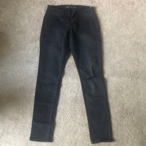 A never been worn skinny faded black Levi jeans